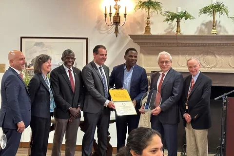 STAR Award ceremony, Tomas Ganz receiving a plaque from the STAR leadership group