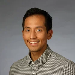 Young man with dark eyes and olive skin